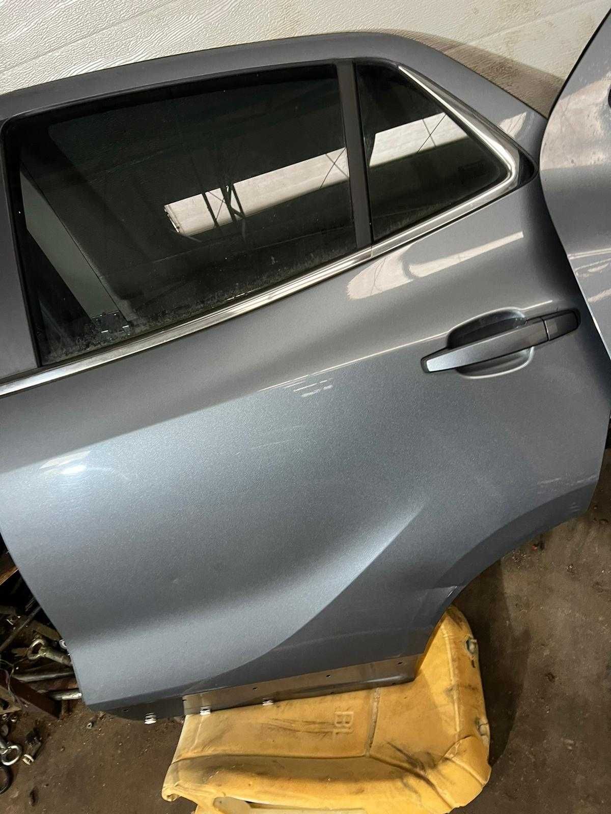 Drzwi Opel Mokka tylne prawe uszkodzone