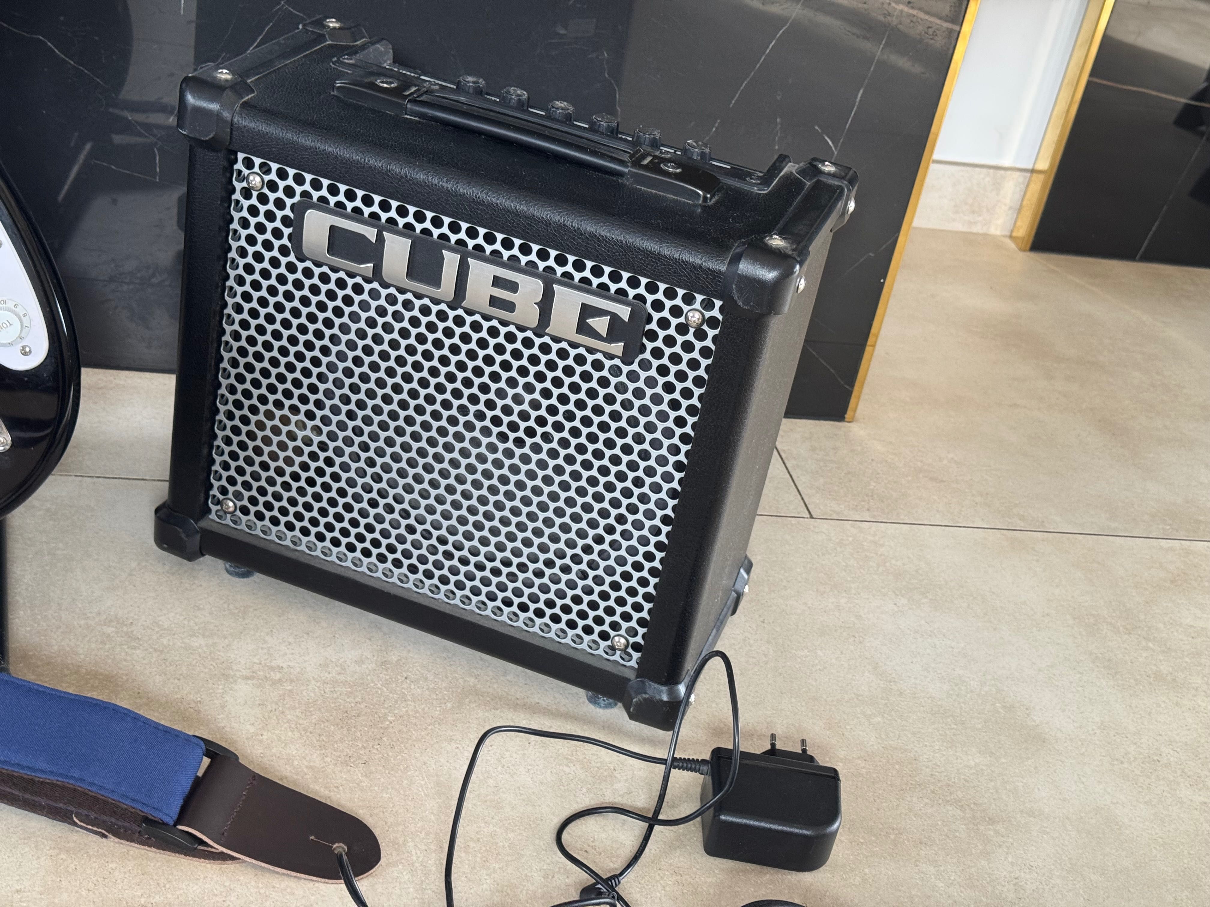 Gitara elektryczna + wzmacniacz (Fender Squier, Roland Cube)