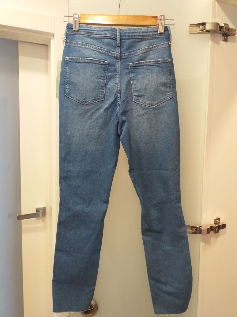 Nowe spodnie jeansy z dziurami, przetarciami H&M 152 cm