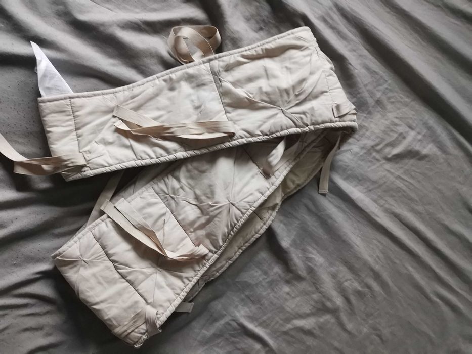 Otulacz na szczebelki ochraniacz do łóżeczka Stokke w stanie idealnym