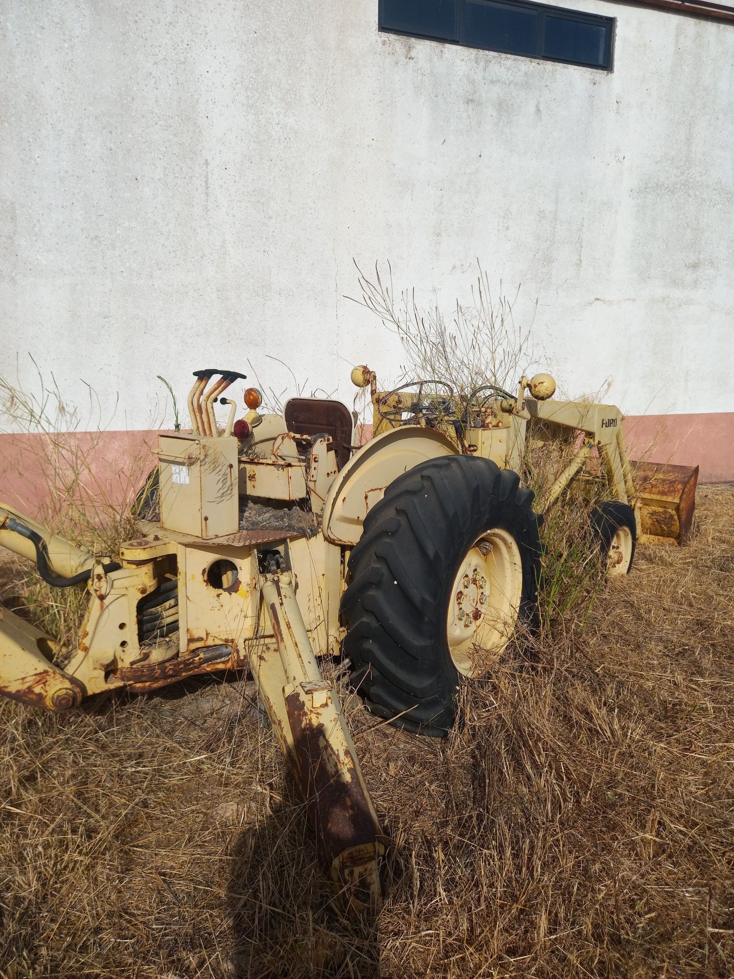 Three Ford Tractores