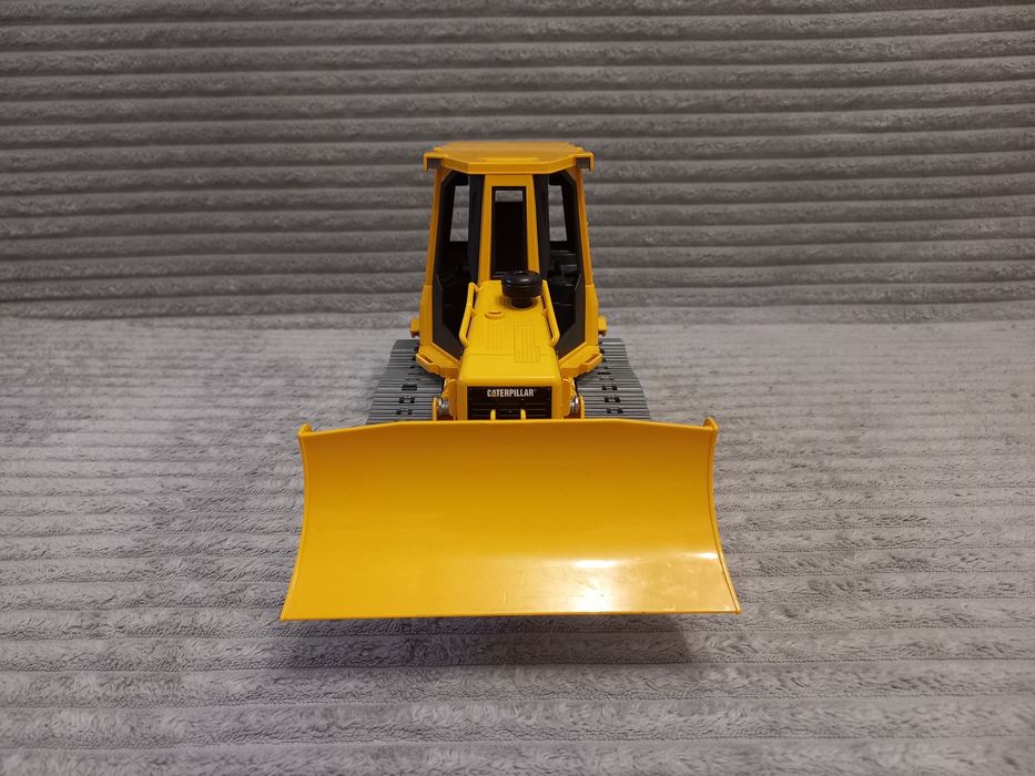 Гусеничний трактор бульдозер CAT від Bruder