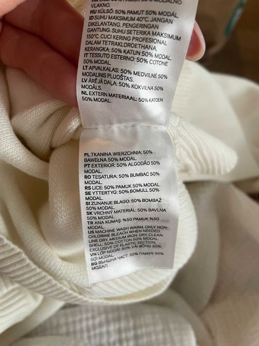 Kremowy sweter męski