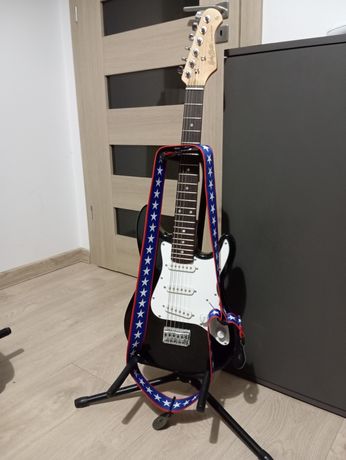 Gitara Harley Benton dla dzieci, kostka, stojak, pasek