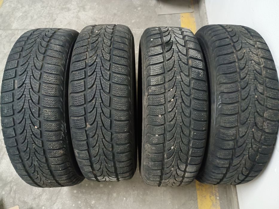 195/65R15 zima Nokian koła 5x100 piasta 57.1  śruby kołpaki zaps 
195/
