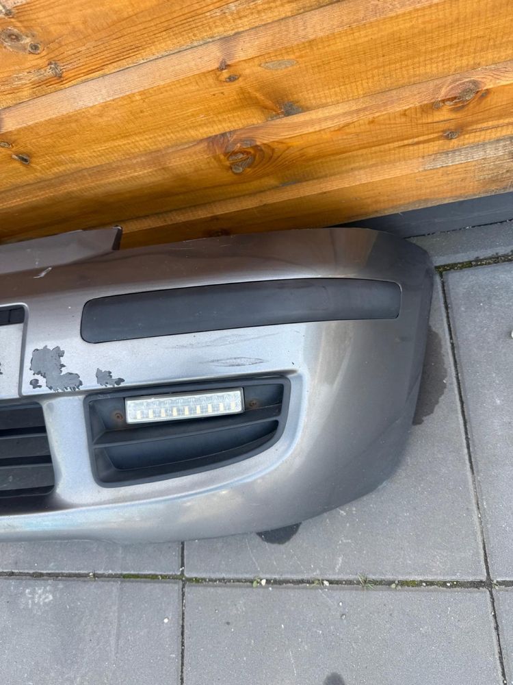 Fiat Panda 2 II zderzak przedni przód 695