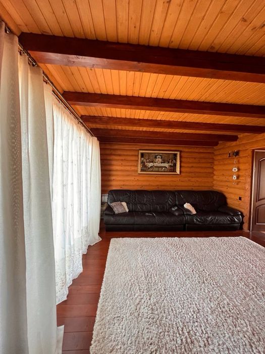 Продаж деревʼяного будинку