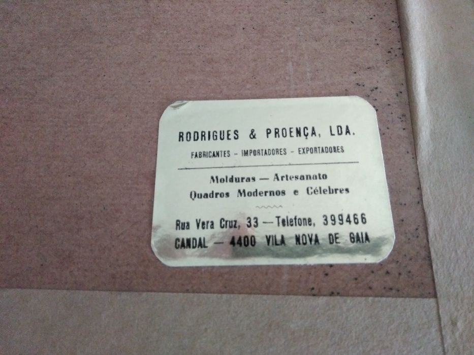 Quadro dourado de um barco