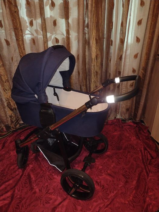 Коляска три в одному