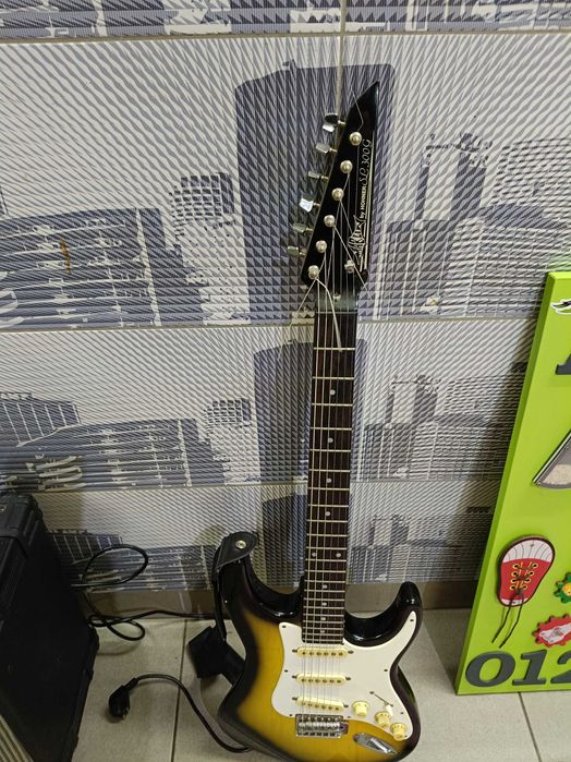 Zestaw gitara oraz wzmacniacz pięć firmy Merlin by Hohner bdb stan