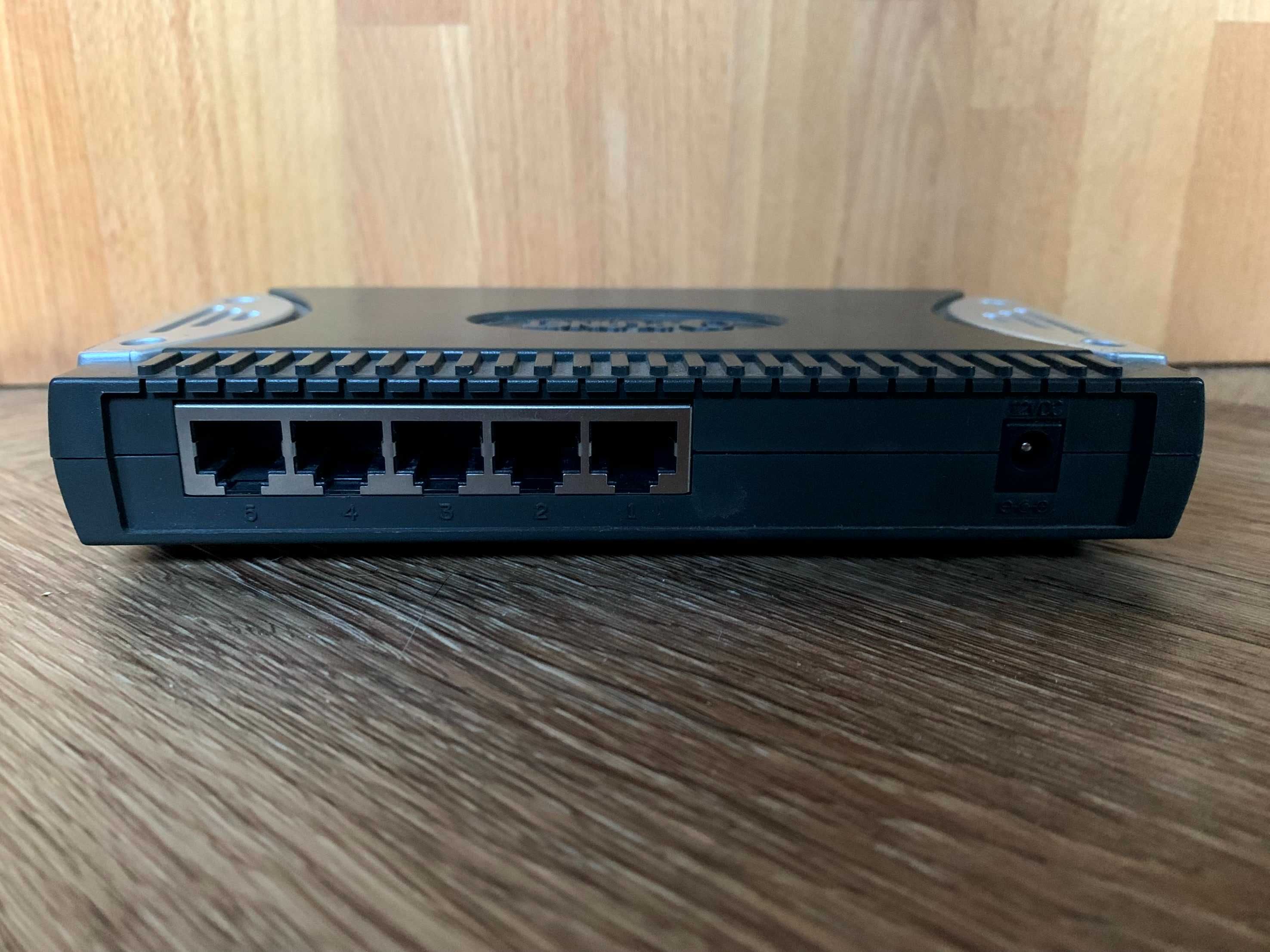 Planet SW-501 ethernet switch z zasilaczem sprawny 12V DC 500 mA BDB