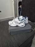 WhiteSilver\NewBalance530DamskieNikeAIrJordan1Travis UnisexTrampki38.5