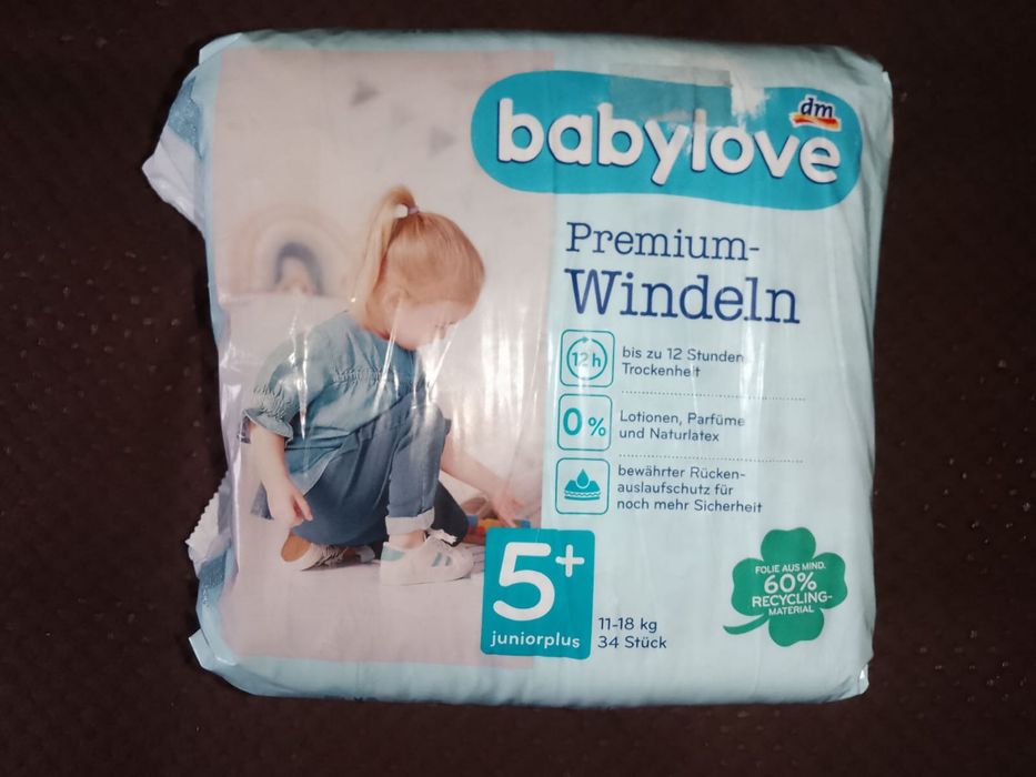 Нові підгузки babylove 5+