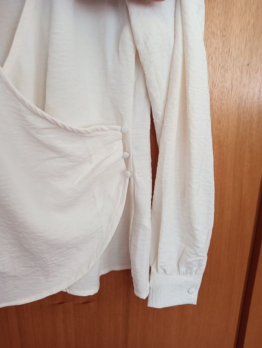 Vendo blusa nova da Tiffosi e top marca Trucco