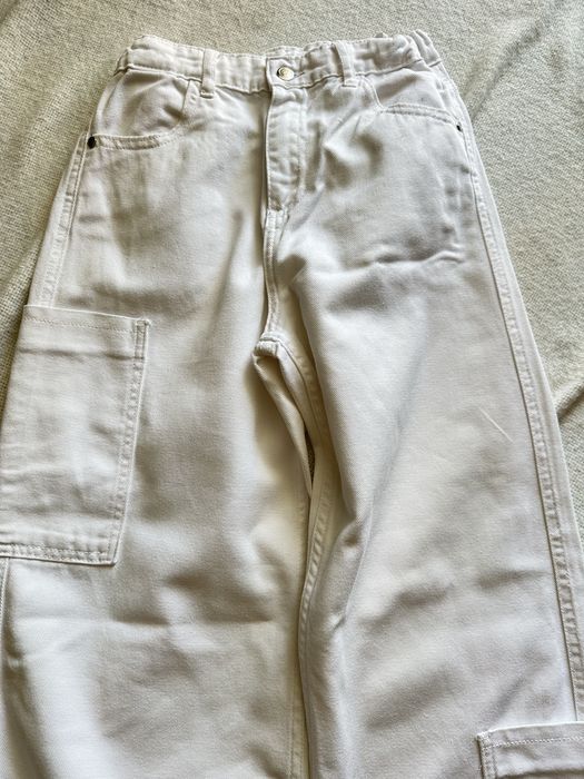 Білі джинси з кишенями 164см