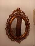 Espelho oval moldura dourada