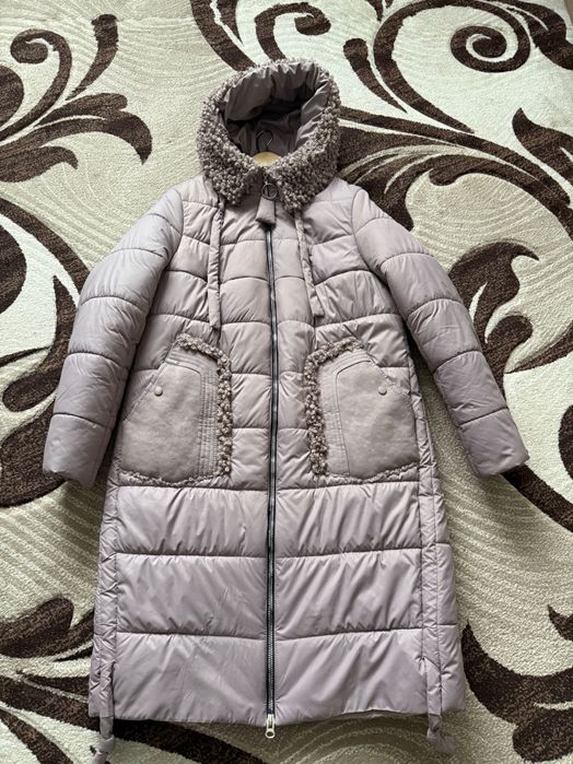 Продаю пуховик 52 розмір.