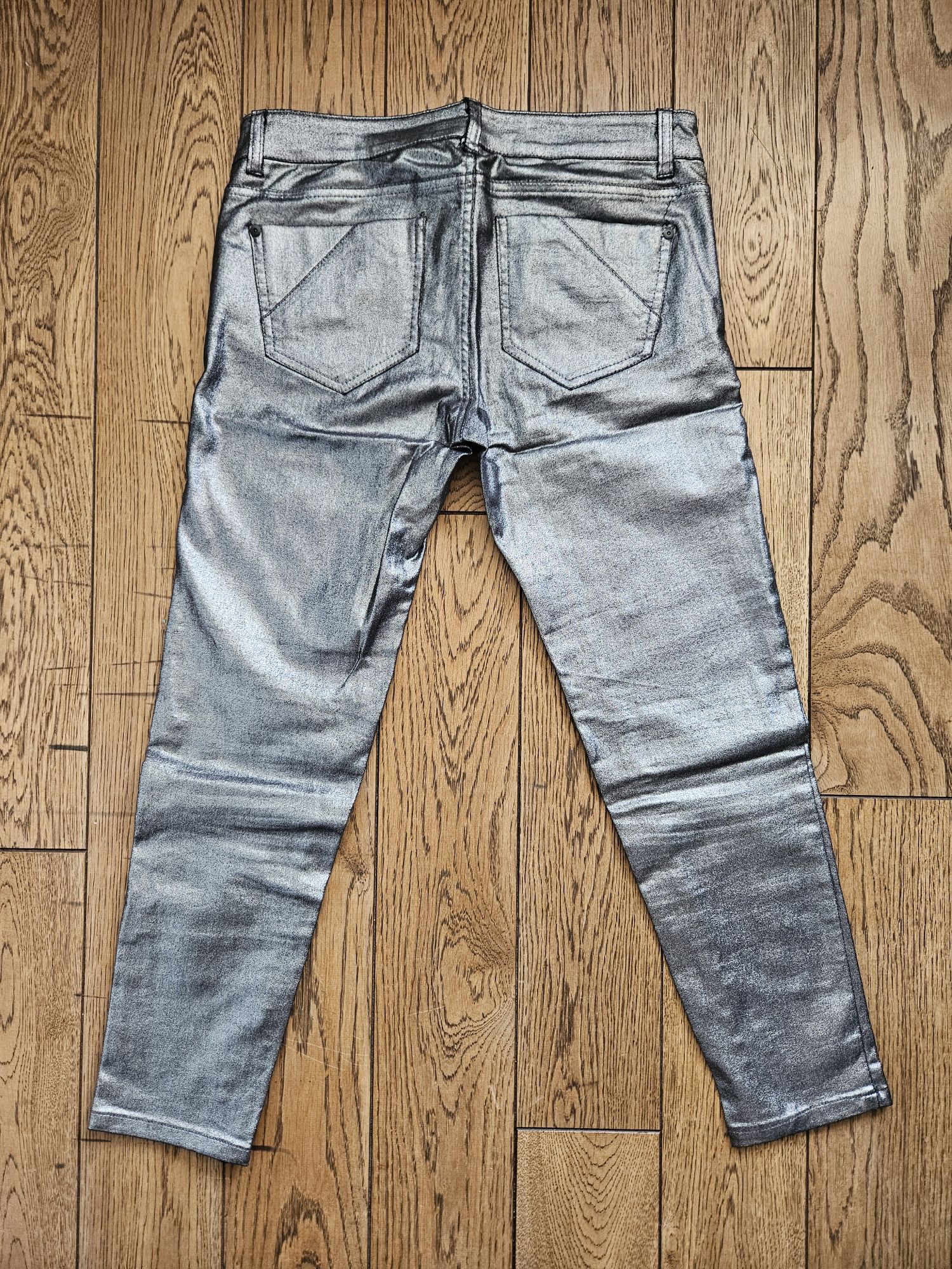 Nieużywane eleganckie spodnie damskie, rurki,srebrne,Terranova, rozm M