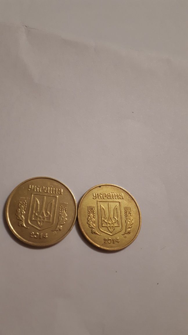Монета Украины 50 копеек 2014 года с обихода  магнитная вес монеты 4.2
