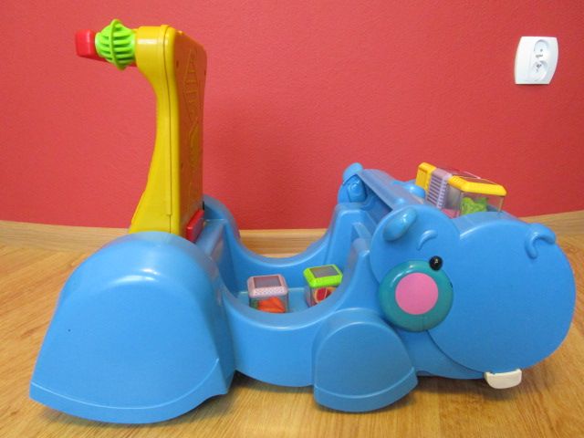 Fisher Price Hipopotam- jeździk, pchacz