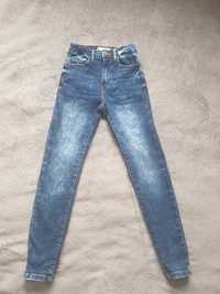 Jeansy dla dziewczynki rozmiar 140 cm