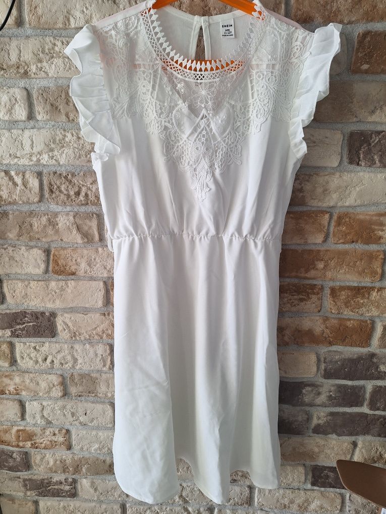Piękna biała, koronkowa  sukienka pokomunijna