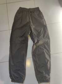 Szare, ortalionowe spodnie dresowe Cropp