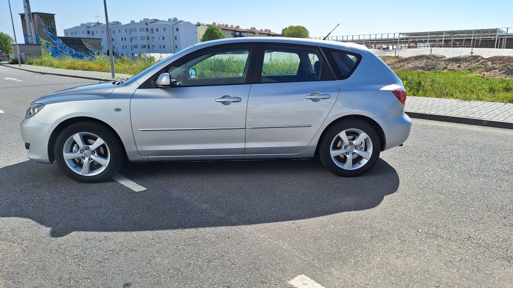 Mazda 3 1.6 GPL.