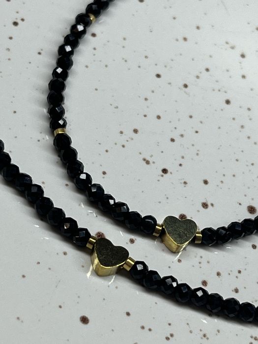 Чокери з чорного оніксу.