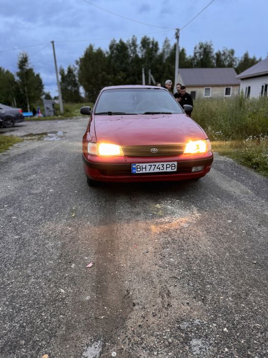 TOYOTA Karina e газ бензин на ходу