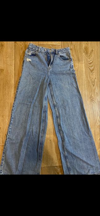 джинси кльош з потертьостями