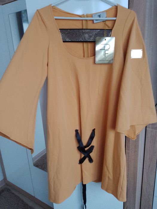 Nowa z metką sukienka