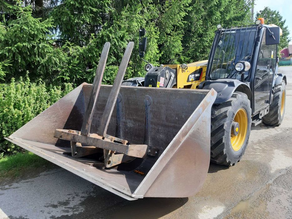 Ladowarka teleskopowa Caterpillar TH407C 2015, 6400mtg