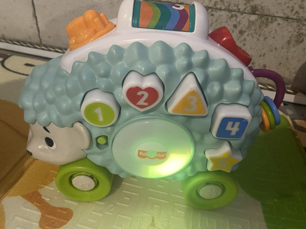 Fisher price їжачок та лінивець їжак