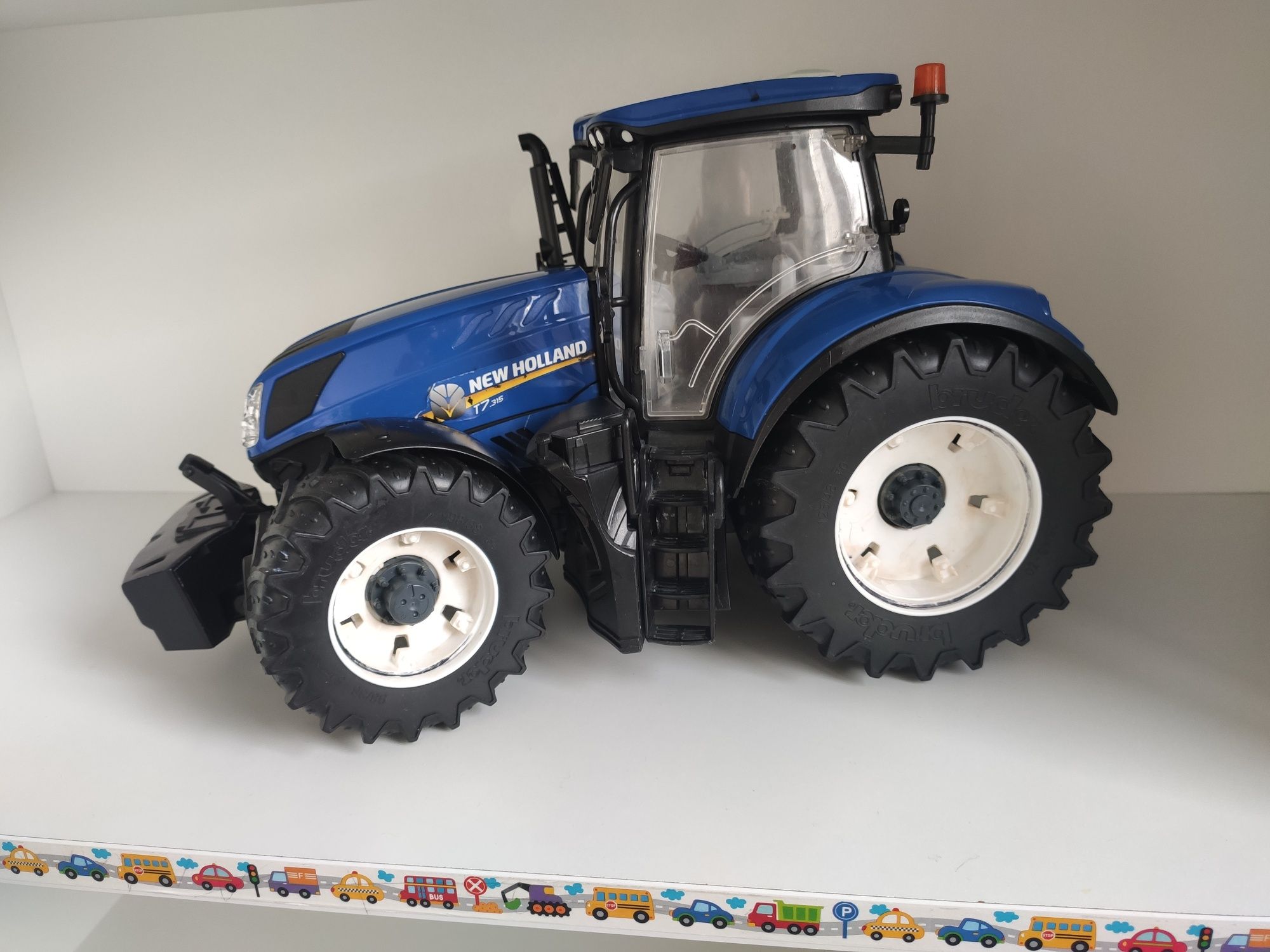 bruder traktor New Holland z ładowaczem