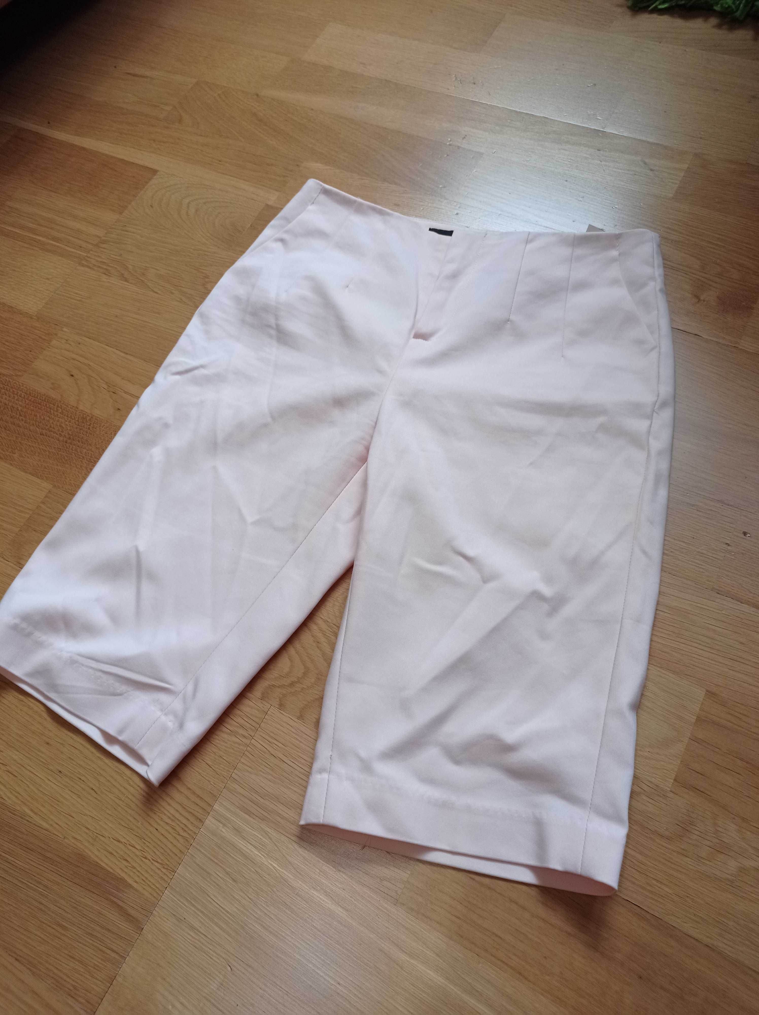 Reserved pudrowe spodnie r.34