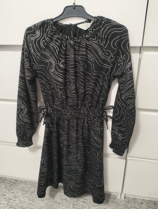 Piękna sukienka z brokatowym wzorem h&m r.134 nowa