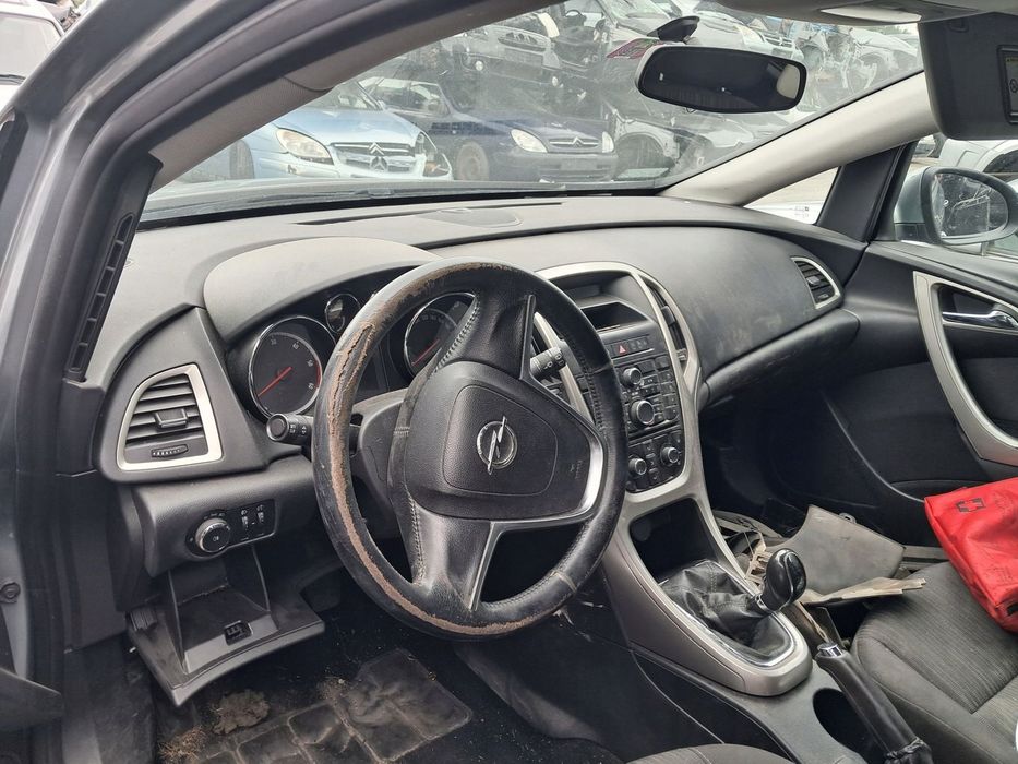 Opel Astra J IV deska rozdzielcza kokpit konsola poduszki pasy airbag EU