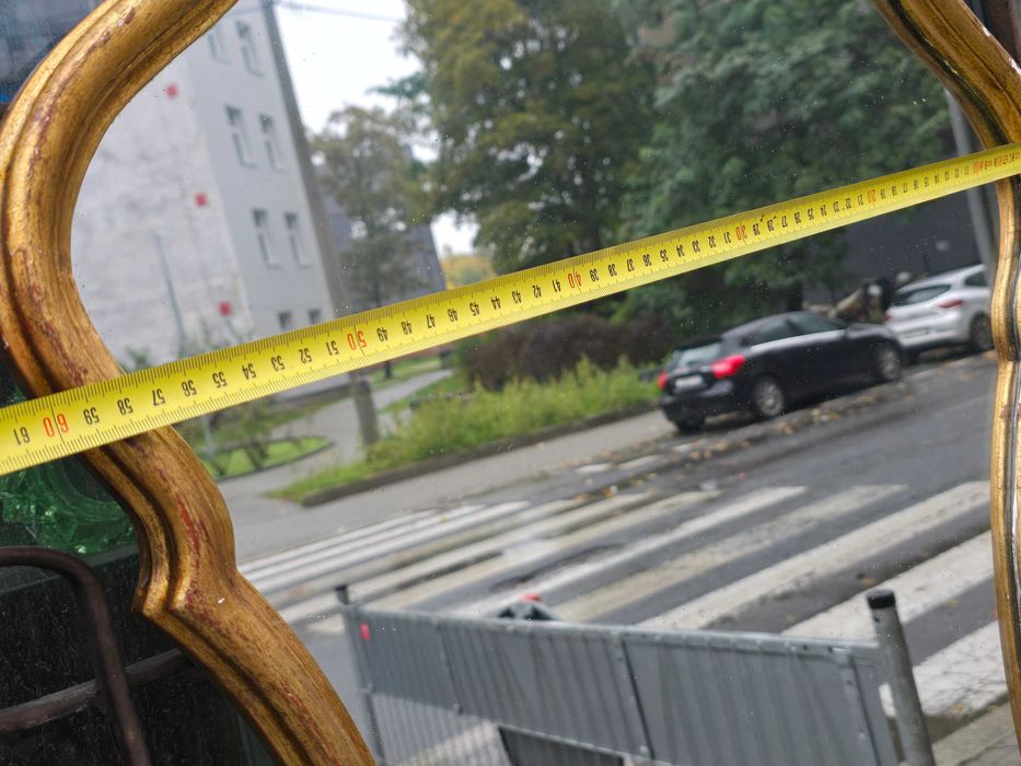 Stare duże podłużne lustro złota rama