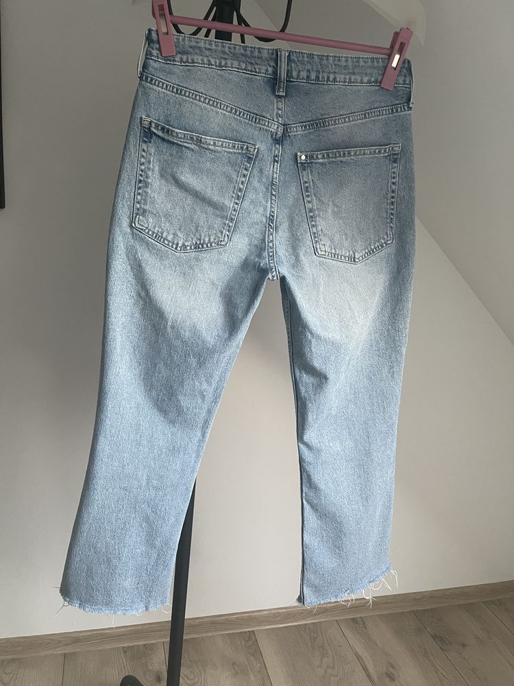 Jeansy przed kostkę lekkie dzwony H&M r.40