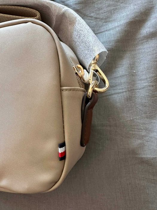 mala tommy nova e original