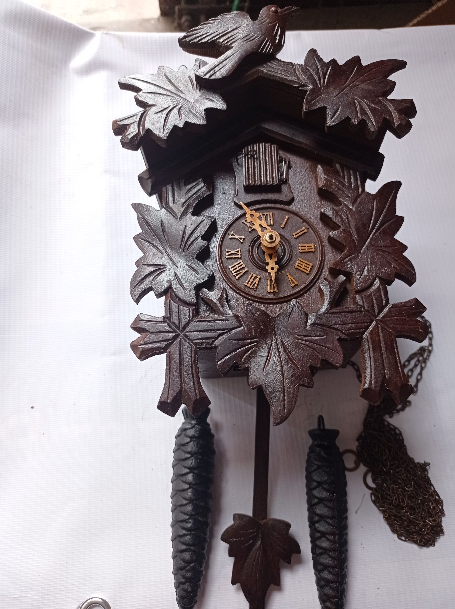Zegar z kukułką sygnowany Reguła. Wahadłowy ,naciąg dobowy. Miniatura.