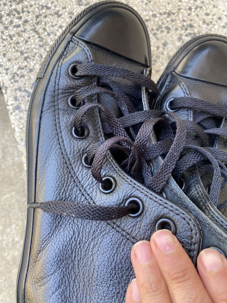 Sapatilha AllStar Converse preta em Couro
