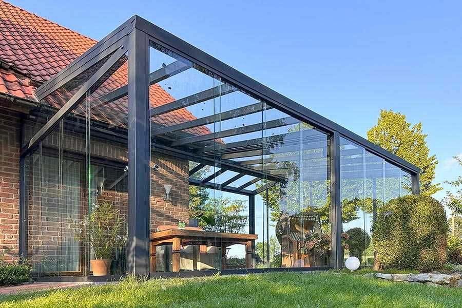 Szklana zabudowa tarasu ogród zimowy