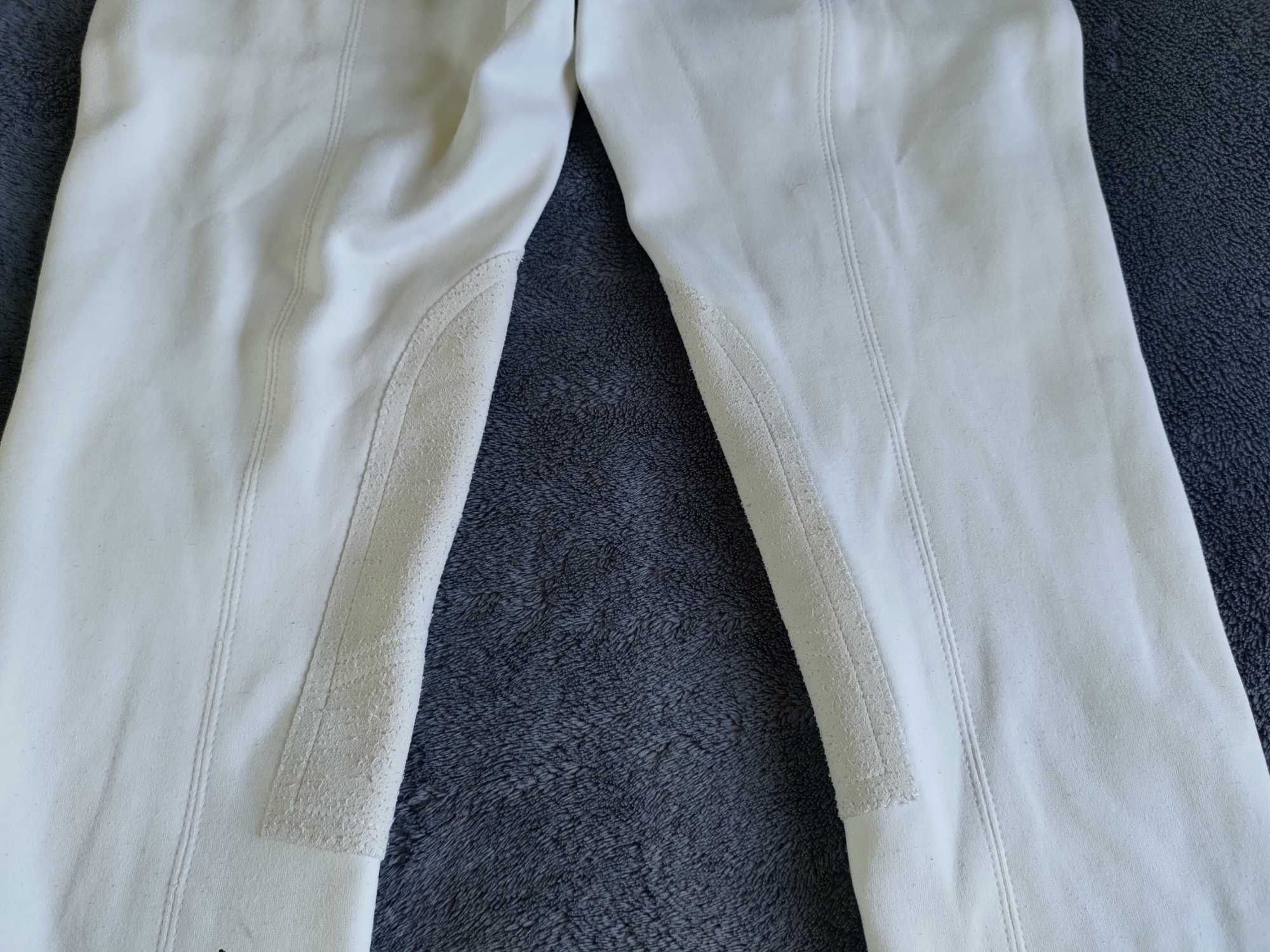 Białe bryczesy jeździeckie z materiałowym lejem na 164 cm