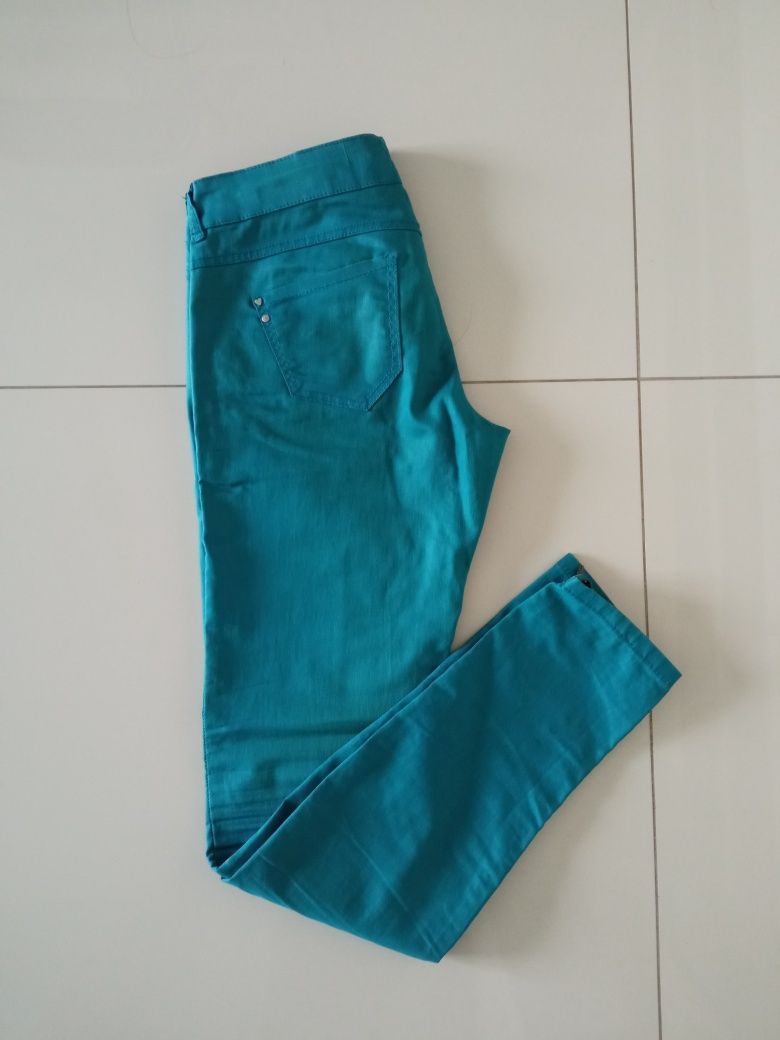 Spodnie jeansowe niebieskie woskowane r. M cropp
