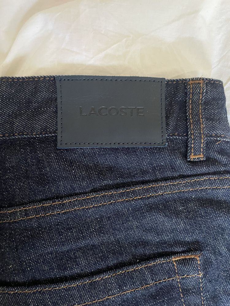 Джинси Lacoste.