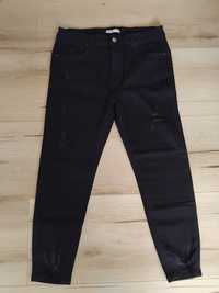 Nowe czarne jeansy 44