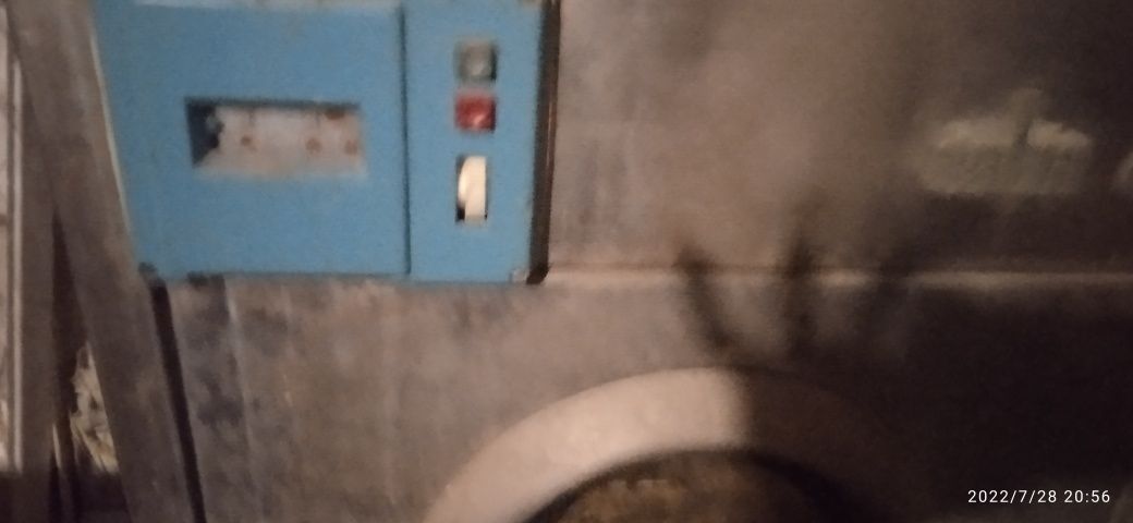 Промислова пральна машинка.