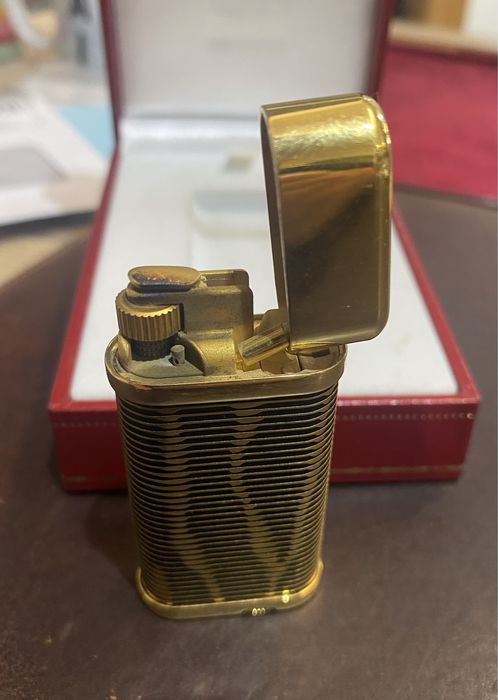 Isqueiro dourado Cartier “ Piton “